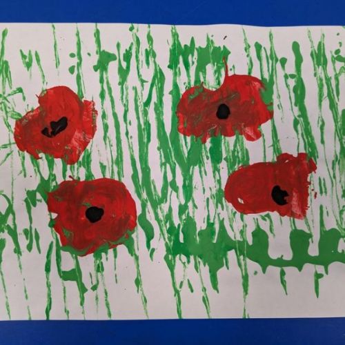 EYFS - We explored printing to create these Remembrance poppy pictures